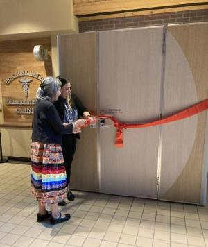 Kandyce Dunlap and Janice Rice cutting the ribbon for the new Lactation Pod at the Ho-Chunk House of Wellness.